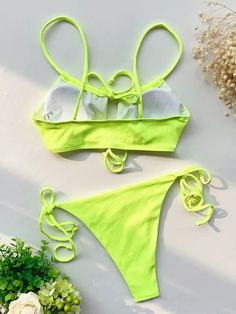 Spaghetti-Neck Hollow Bralette Tie Side Solid Color Bikini Swimwear Green Sleeveless Seamless Swimwear, Green String Swimwear For Summer, Solid Color String Swimwear For Summer, Fitted Green Swimwear With Straps, String Swimwear For Summer, Green Strapped Swimwear For Poolside, Green Seamless Swimwear For Beach Season, Green Triangle Top Swimwear With Straps, Seamless Green Swimwear For Sunbathing