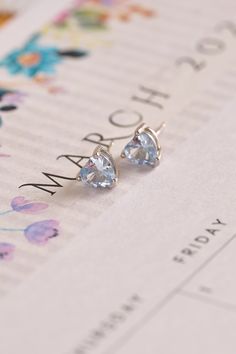 Our March Birthstone Earrings make for a thoughtful gift or lovely personal purchase this Mother’s Day. Celebrating March with its unique aquamarine stone, these claw stud earrings feature a lovely heart shape. Aquamarine is said to bring health and hope to those born in this month. March Birthstone Jewelry, Birthstone Earrings, March Birthstone, Aquamarine Stone, Birthstone Earring, March Birth Stone, Birthstone Jewelry, Cute Jewelry, Heart Shape