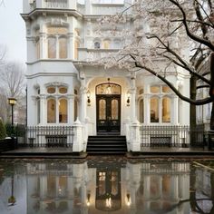 a large white house with lots of windows