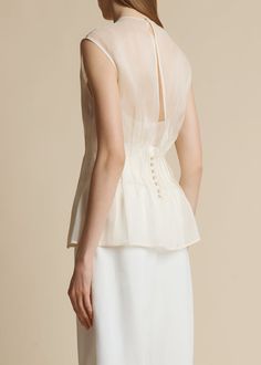 Elegant Sleeveless Organza Blouse, Elegant Sleeveless Sheer Blouse, Elegant Wedding Tops With Boned Bodice, Elegant Button Back Summer Tops, Elegant Fitted Organza Top, Elegant Summer Tops With Button Back, Elegant Summer Top With Button Back, Elegant Tops With Ruffles And Fitted Bodice, Elegant Sleeveless Organza Top