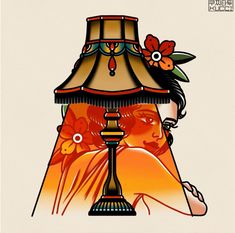 a lamp with a woman's face on it next to a flowered lamp shade