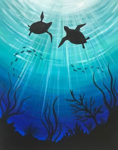 two sea turtles swimming in the ocean