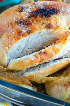 a roasting chicken in a casserole dish