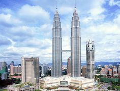 an aerial view of some very tall buildings