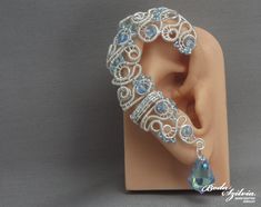 Wire Wrapped Bridal Ear Wrap With Crystals Silver and Light - Etsy Hungary Flower Ear Cuffs, Blue Wedding Jewelry, Black Onyx Jewelry, Jewelry Ear, Steampunk Earrings, Light Blue Wedding, Peridot Jewelry, Bridal Wrap, Flower Ear