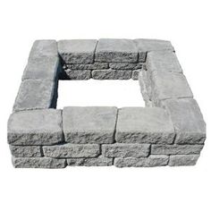 an image of a stone fire pit in the shape of a square