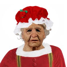 an old woman wearing a santa claus hat