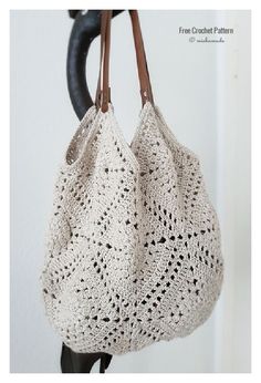 a crocheted bag hanging from a hook