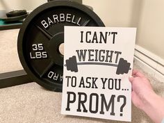 someone holding up a card that says, i can't weight to ask you prom?