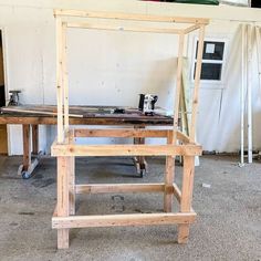 a wooden frame sitting on top of a table