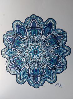 a drawing of a blue and white flower