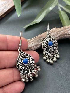 Indus Earrings : Back to our Roots. For the women who makes a statement.  An exclusive shop for earrings. Wear them with pride.  These are dangling drops style earrings . An unique handmade Indian style ethnic bohemian/ Tribal earrings in silver shade with blue enamelled .  These earrings are made from high quality Tatanium / German silver material  which are hypoallergenic and free from corrosion & rusting. An uniquely crafted dangling drops earrings in blue  Notes : The product shipped will be Bohemian Teardrop Pierced Earrings, Nickel-free Festive Danglers, Traditional Tassel Dangle Earrings For Festivals, Silver Bohemian Drop Danglers, Festive Bohemian Tassel Drop Earrings, Bohemian Silver Danglers For Festival, Silver Bohemian Danglers For Festival, Bohemian Metal Tassel Earrings For Pierced Ears, Bohemian Festive Plug Earrings With Latkans