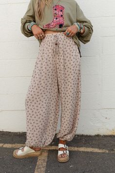 Excited to bring you the Emberlyn Wide Leg Cinched Pants from our exclusive collection; The Nest by Three Bird Nest. Check out the rest of the collection here - Inspired by you, created by us. Comfortable woven fabric with so pretty floral print throughout Relaxed and loose wide leg jogger pant silhouette Classic high-rise drawstring waistline with so cute wooden beads for added boho style Convenient side seam pockets Elastic closure at ankle Pair with: Tattoo Bralette, Soft Drift Short Sleeve T Stars Bracelet, Boho Essentials, Bralette Outfit, With Tattoo, Three Bird Nest, Comfy Pants, The Nest, Bird Nest, New Tops