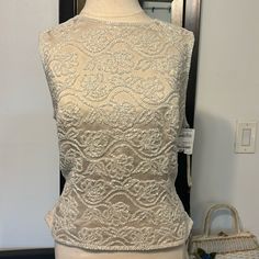 This Is A Beautiful Vintage 80s Evening Piece. The Beads Are Intact. Dead Stock. New With Tags. From Loehmanns!! It Is Lined And Is A Heavy Weight Piece. Perfect For Under A Sweater Or Blazer Or Worn Alone. Size 14. Measurements Flat Pit To Pit 20” Waist 17” Length 21” Sleeves 10” Black Tie Women, Tie Tops, Tie Women, Oleg Cassini, Black Tie, Heavy Weight, Sleeveless Top, Womens Tops, Blazer