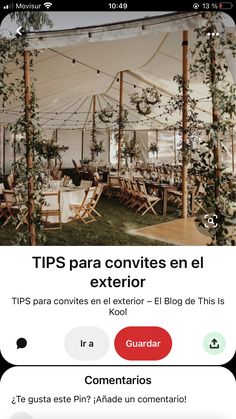 an image of a tent set up with tables and chairs