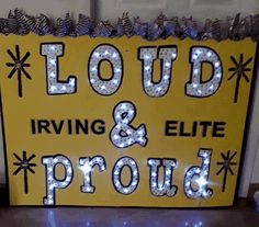 a yellow sign that says loud, irving & lite proud