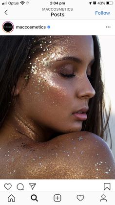 a woman with gold glitter on her body