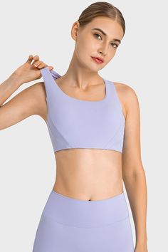 Breathable Stretch Sports Bra With Tank Straps, Sleeveless Moisture-wicking Sports Bra, Sleeveless Nylon Sports Bra With 4-way Stretch, Sports Nylon Bra With Tank Straps, Nylon Sports Bra With Tank Straps, 4-way Stretch Sleeveless Sports Bra, Stretch Sports Bra With Built-in Padding And Tank Straps, Solid Nylon Sports Bra With Built-in Bra, Nylon Activewear With Built-in Bra