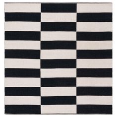 a black and white rug with squares on it