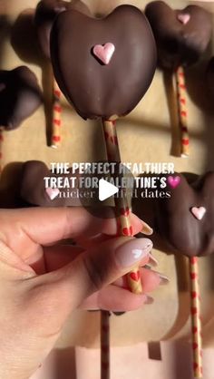 Melissa on Instagram: "SNICKER STUFFED DATE HEART POPS💗

I turned my no bake snicker stuffed dates into the cutest Valentine’s Day heart pops. A perfect DIY gift for your Valentine’s or Galentine’s day festivities❤️Or just a delicious treat to have stashed in your freezer when you want something sweet.

How to make snicker stuffed date heart pops:
1. Make a slit down your medjool dates and remove the pits
2. Carefully pull apart to form the heart and gently press down to flatten a bit
3. Fill each date with organic peanut butter and top with chopped peanuts
4. Dip a festive heart straw in melted chocolate and place in the center
5. Freeze to allow the straw to adhere
6. Dip each pop in melted chocolate, place on lined baking sheet, add a festive heart candy, and freeze until the chocolate