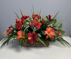 1 tropical  arrangement made from artificial  flowers and greenery in rectangular seagrass basket. It is perfect to decorate your home in tropical style.  One of a kind. The attached arrangement  measures: 20x12x9 inches. The basket measures 8.5x5.5x3.5 inches. Thank you for visiting my shop! Luau Party Centerpieces, Tropical Centerpieces, Jungle Party Decorations, Tropical Flower Arrangements, Lantern Centerpieces, Tropical Birthday, Flowers And Greenery, Centerpiece Table, Birthday Centerpieces