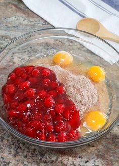 the ingredients for cranberry sauce in a glass bowl