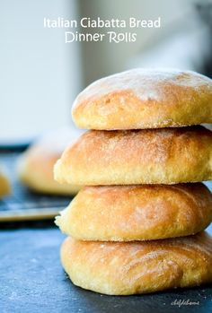 three italian ciabatta bread dinner rolls stacked on top of each other