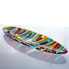 "Fused glass unique rainbow oval platter, made in Israel.  Size:( 17x47 cm) 6.69\" x 18.5\" 🌈 Welcome to my vibrant world of fused glass art! 🌈 Add a touch of color and elegance to your dining table, coffee table, or home decor with my Fused Glass Unique Rainbow Oval Platter. A colorful platter could feature a range of hues, from bold and bright to more subtle and pastel shades. The colors may be arranged in a pattern or design, or they may be more abstract and organic in their placement. Each Abstract Fused Glass Ideas, Fusing Glass Art, Fused Glass Plates Serving Platters, Fused Glass Patterns Free, Fused Glass Platters, Fused Glass Tray, Fused Glass Bowls Ideas, Glass Fusion Ideas Inspiration, Fused Glass Ideas Tutorials