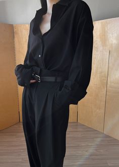 Color: BlackLightweight breathable shirting fabricOversized fit Pointed collar Button front closure Button cuffs65% Lyocell 25% Rayon 10% Wool Dry CleanBy The Frankie Shop. Imported Black Button Up Shirt, Black Wide Leg Trousers, Shirting Fabric, The Frankie Shop, Frankie Shop, School Looks, Pleated Trousers, Mode Inspo, Tomboy Fashion