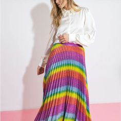 The Always Stand Out Midi Skirt Features A Pleated Texture, Crafted With A Metallic Thread For A Luxe Feel. The Elegant Side Zipper Closure Elevates The Look, Ensuring You'll Make A Statement With Every Step. Perfect For Any Special Occasion, This Midi Skirt Is Guaranteed To Help You Stand Out. Multicolor Long Skirt For Fall, Multicolor Flared Maxi Skirt For Fall, Multicolor Flared Skirt For Fall, Multicolor Maxi Skirt For Fall With Relaxed Fit, Relaxed Multicolor Maxi Skirt For Fall, Fall Multicolor Relaxed Maxi Skirt, Yellow Pleated Party Bottoms, Multicolor Lined Maxi Skirt For Fall, Multicolor Flared Maxi Skirt For Party