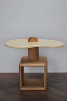 a small table with a wooden base on top