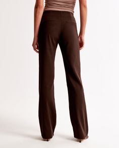 High rise pants, that are fitted at the waist and hips, slightly relaxed at the thigh and eases at the knee into a full-length boot leg shape, in our matte sculpt fabric, featuring a clean front waistband and a fly closure for a secure fit. Coffee Sizes, Women's Bottoms, High Rise Pants, Athletic Fits, New Arrival Dress, Swimwear Accessories, Trousers Women, Abercrombie Fitch, The Knee