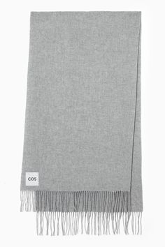 Crafted from 100% RWS-certified wool, this rectangular scarf has a luxuriously soft hand feel and is offered in a striking tangerine-orange hue. It's detailed with a COS logo patch and fringed ends. Certified according to the Responsible Wool Standard, to protect the welfare of the sheep and their environment 100% RWS Wool / Dry clean 204cm x 73cm Gifts Banner, Grey Scarf, Tangerine Orange, The Sheep, Scarf Hat, Soft Hands, Wool Scarf, Soft Hand, Layers Design