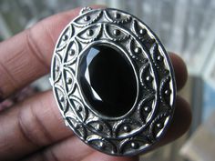 This is a beautiful vintage Avon silver tone and faux onyx solid perfume locket and brooch pendant from 1966. It's a vintage modern piece of "Mourning jewelry".   It still has it's original perfume. The antiqued silver is still gleaming and there are no chips on the stone.  It measures 1 1/4'' by  5//8''. In very good condition with the perfume mostly there. It has a nice powery smell to it. THe working conditoin is goos as well. This is definitely a great Steampunk/Gothic piece of jewelry! Perfume Locket, Avon Vintage, Steampunk Cosplay, 2024 Style, Gothic Steampunk, Solid Perfume, Vintage Avon, Vintage Jewels, Vintage Modern