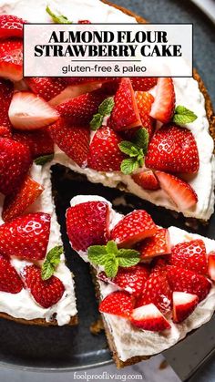 a close up of a cake with strawberries on it and the words, almond flour strawberry cake