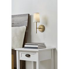 The modern design of the Better Homes & Gardens Meadowood Wall Sconce stands out in any home. The vintage lantern shape adds style to any space while the white fabric shade softly distributes light. A burnished brass finish completes the modern glam motif. Perfect for placing on either side of your bed, above your sink in the kitchen, or above your couch in the living room as a stunning statement piece. Size: One Size.  Color: Gold. Bed Side Wall Lamp, Vintage Sconces Bedroom, Mantle With Sconces, Bed Side Wall Lights, Bedside Sconces Wall Mount, Sconces In Bedroom, Bed Sconces, Bedside Sconces, Bedside Wall Lamp