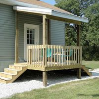 a house with a porch and steps leading to the front door