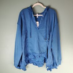 Anthropologie Daily Practice The Sapphire Hoodie Oversized Slouchy Blue Size Xl New With Tags. Fabric Flaw As Shown In 4th Photo Shark Bite Hem Oversized Slouchy Fit V-Neck Pullover Styling Blue Lagenlook Tops With Relaxed Fit, Oversized Loungewear Tops With Drawstring Hood, Oversized Hooded Top For Loungewear, Oversized Tops With Drawstring Hood For Loungewear, Oversized Cozy Top With Drawstring Hood, Blue Hoodie With Drawstring Hood, Washed Blue Long Sleeve Winter Sweatshirt, Blue Oversized Cozy Sweatshirt, Blue Cozy Oversized Sweatshirt