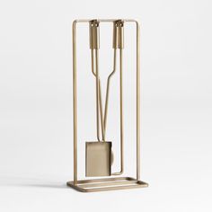 a lamp that is on top of a metal stand with two lamps attached to it