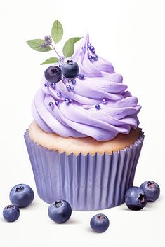 a cupcake with purple frosting and blueberries