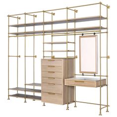 an image of a dressing room set with mirror and drawers on the side, gold metal frame