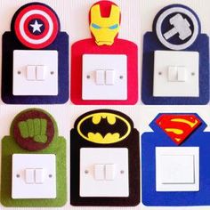 the four switch plates are decorated with superheros and captain america emblems on them