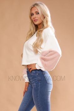 Cropped Sweatshirt with Faux Fur Sleeves – KNOWSTYLE | @knowstyleusa #knowstyleusa #knowstyle #KShottie #croptop #sexycroptop #casualcroptop #sexybodysuit #cutebodysuit #blackbodysuit #lacebodysuit #fashionista #ootd #instafashion #streetstyle #womensfashion #womenswhitetop #streetfashion #streetwear #fashionaddict #summeroutfits Fur Sleeves, Cropped Sweatshirt