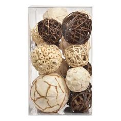 a box filled with lots of different types of balls and nets on top of each other