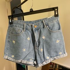 Super Cute Higher Rise Shein Jean Shorts With Cute Daisy Embroidery On The Front. Never Worn Or Washed, Too Big And Didn’t Return Reach Out With Questions Or Offers! Trendy Blue Bottoms With Floral Embroidery, Cute Embroidered Blue Bottoms, Casual Floral Embroidered Shorts For Spring, High-waisted Blue Jean Shorts With Floral Embroidery, High Waist Blue Jean Shorts With Floral Embroidery, Blue High Waist Floral Embroidered Jean Shorts, High Rise Summer Bottoms With Floral Embroidery, Blue High-waisted Floral Embroidered Jean Shorts, Casual High Waist Bottoms With Floral Embroidery