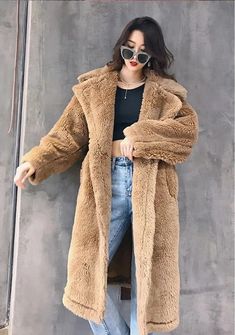 Cozy Winter Faux Fur Warm Long Coat on Luulla Warm Faux Fur Coat For Fall, Fluffy Beige Fur Coat For Winter, Winter Beige Fluffy Fur Coat, Brown Fluffy Long Sleeve Fur Coat, Fluffy Brown Fur Coat For Winter, Fluffy Brown Fur Coat For Cold Weather, Solid Color Faux Fur Coat For Winter, Trendy Brown Faux Fur Coat, Solid Color Long Faux Fur Coat