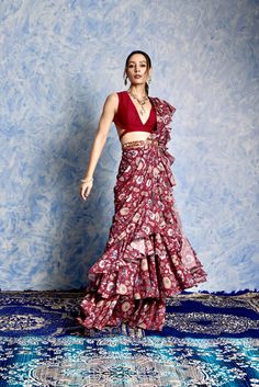 Maroon Georgette printed Ruffle Pre stitched saree with Plunge Neck Silk Blouse and Hand Embroidered Belt Navratri Party Pre-draped Saree With Printed Motifs, Festive Floral Print Floor-length Saree, Festive Floor-length Floral Print Saree, Festive Floor-length Floral Saree, Bollywood Style Festive Pre-draped Floral Saree, Bohemian Style Festive Pre-draped Saree With Floral Print, Bollywood Style Pre-draped Saree With Printed Motifs For Reception, Traditional Pre-draped Saree With Floral Print For Party, Floral Print Pre-draped Saree For Navratri Party