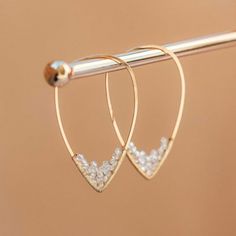 These stunning earrings are hand forged and wrapped with tiny stone detail that shimmers at the point of the hoop. Diamond Huggies, Buy Pearls, Buying Diamonds, Fuchsia Color, Stunning Earrings, Austrian Crystal, Hand Forged, Christmas Ideas, Jewelry Crafts