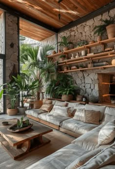 Earthy living room ideas center around natural tones and textures to create a grounding and tranquil Wood Home Interior Design, Earthy Chic Living Room, Earthy Modern Interior Design, Tropical Minimalist Interior, Bali Living Room, Earthy Homes, Fall Interior Design, Dark Brown Walls