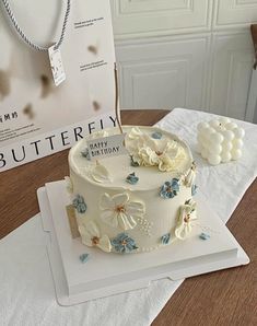 a white cake sitting on top of a table